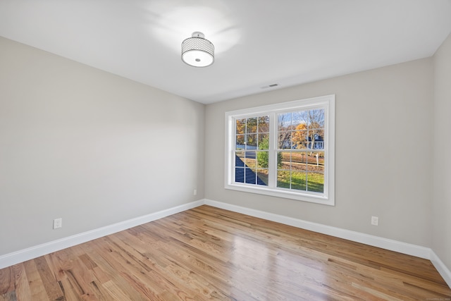 empty room featuring light hardwood / wood-style floors