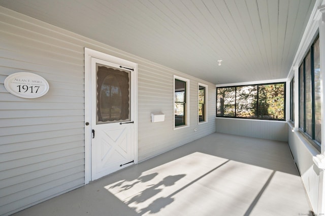 46 Lyme St, Old Lyme, CT 06371 - unfurnished sunroom with wood walls and wood ceiling