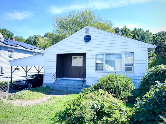 view of front of house featuring a carport