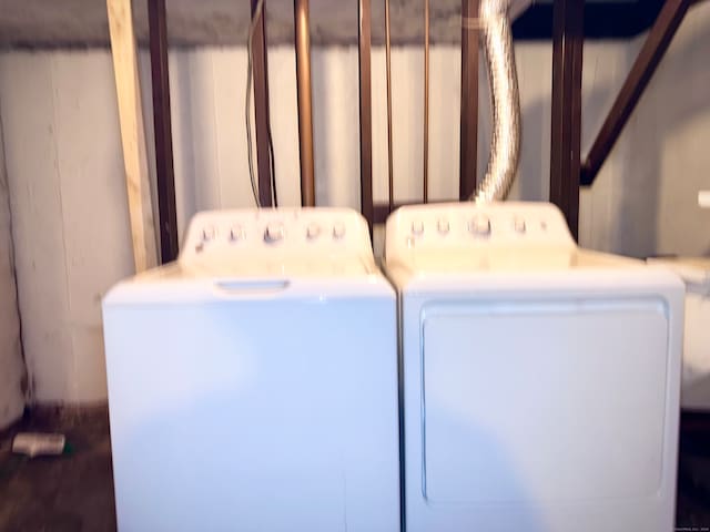 laundry room with washer and dryer