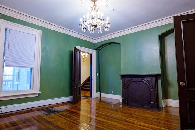 interior space featuring ornamental molding, baseboard heating, dark wood-type flooring, and a chandelier