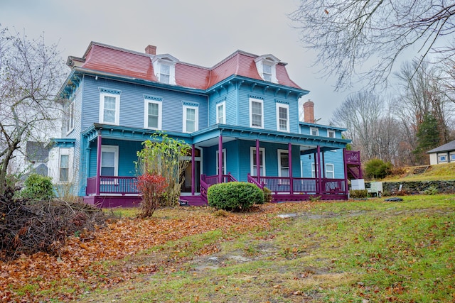 view of front of property featuring covered porch