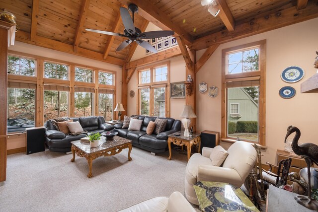 living room featuring beam ceiling, carpet floors, ceiling fan, and wooden ceiling