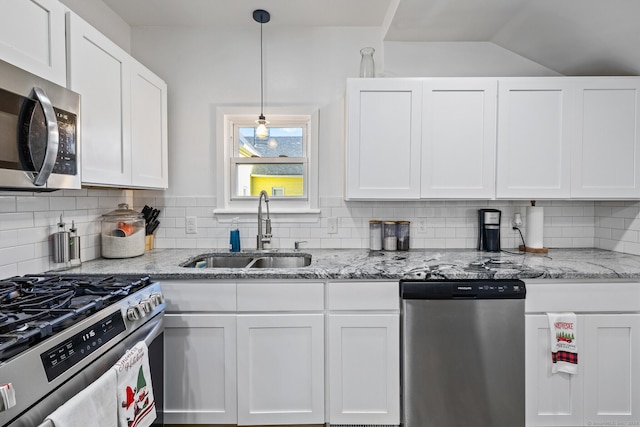 kitchen featuring white cabinetry, sink, and stainless steel appliances