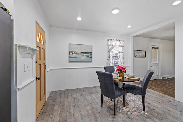 dining room featuring light wood-type flooring