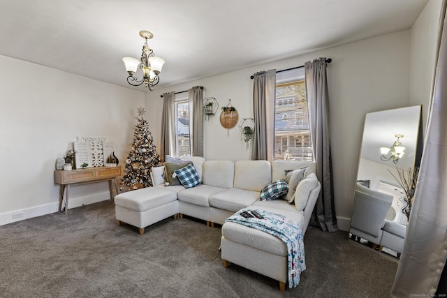 carpeted living room with a notable chandelier