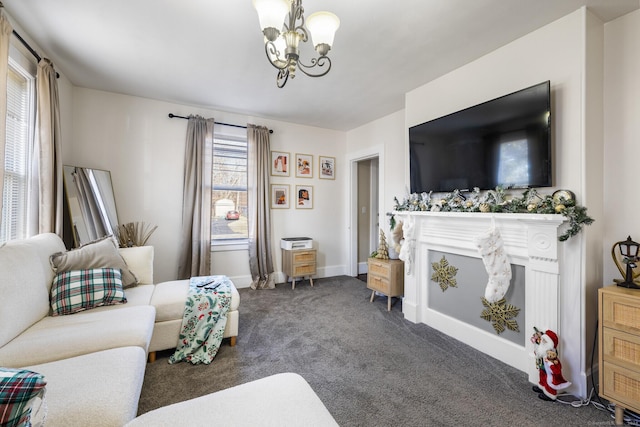 living room featuring a chandelier and dark carpet