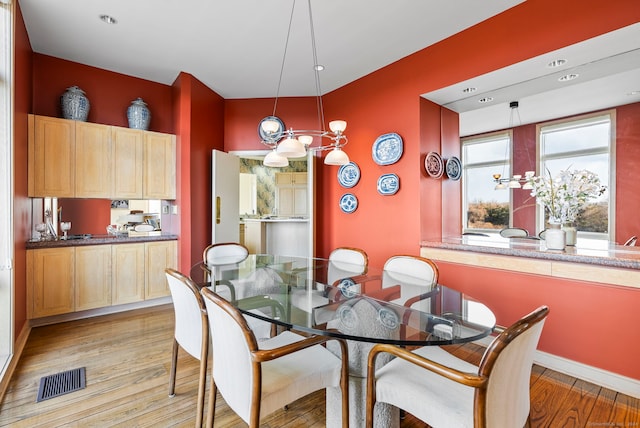 dining room featuring light hardwood / wood-style flooring