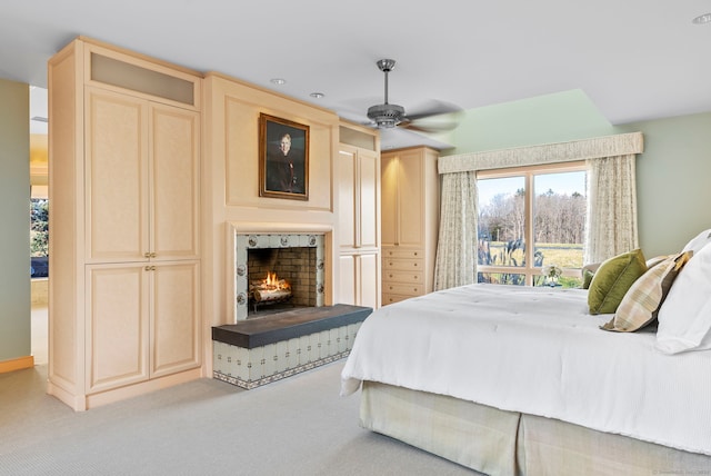 carpeted bedroom with ceiling fan