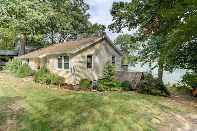 view of property exterior featuring a yard