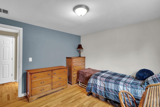 bedroom featuring light hardwood / wood-style floors