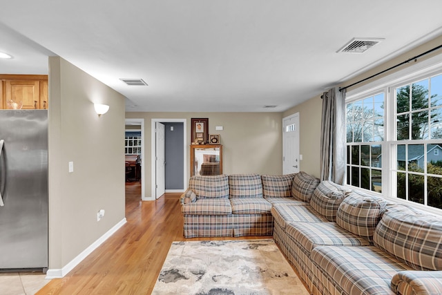 living room with light wood-type flooring