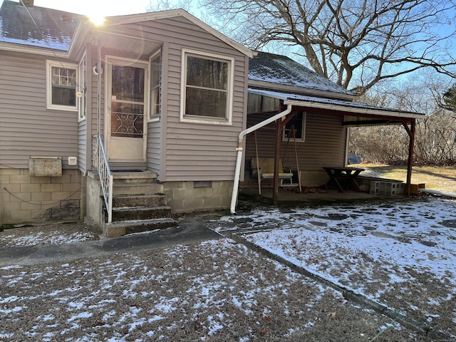 view of snow covered property