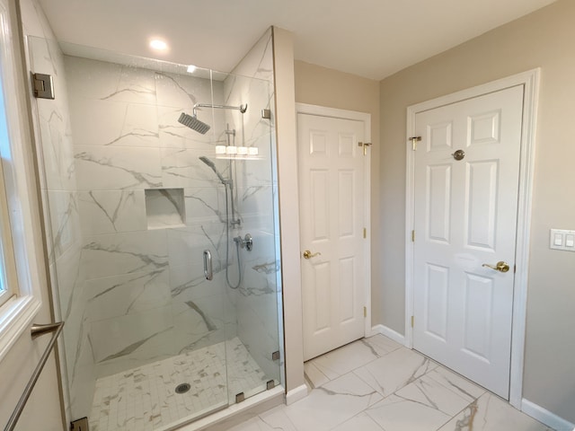 bathroom featuring an enclosed shower