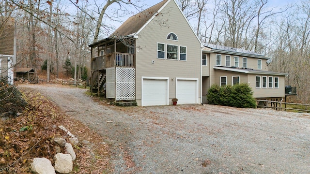 view of side of property with a garage