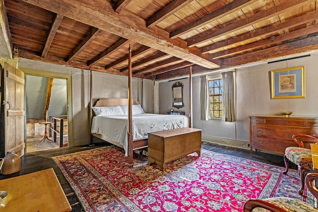 bedroom featuring beamed ceiling and wood ceiling