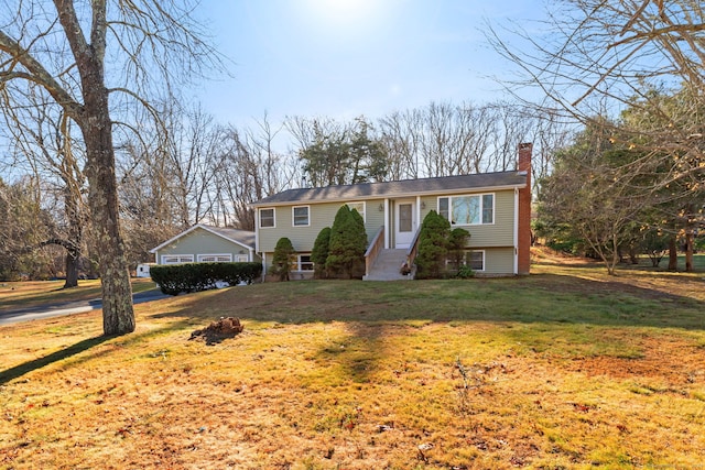 view of front of home with a front yard