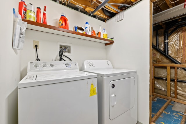 laundry area featuring washing machine and clothes dryer