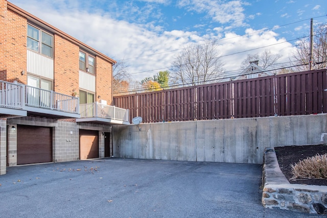 exterior space with a garage