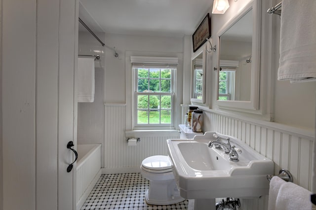 279 Black Rock Tpke, Redding, CT 06896 - bathroom featuring a wainscoted wall,  shower combination, and tile patterned flooring