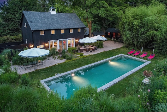 279 Black Rock Tpke, Redding, CT 06896 - back of house with an exterior structure, an outdoor structure, an outdoor pool, a patio area, and outdoor dining space