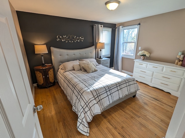 bedroom featuring light hardwood / wood-style floors