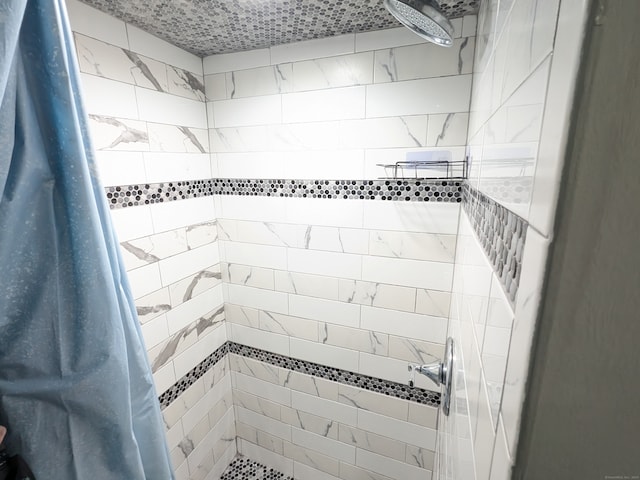 bathroom with curtained shower