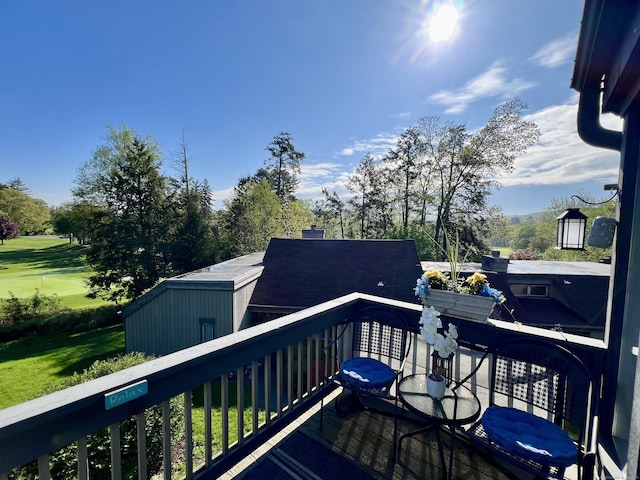 deck with view of wooded area