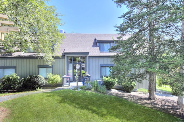 270 Heritage Vlg Unit D, Southbury, CT 06488 - view of front facade featuring a front lawn and roof with shingles