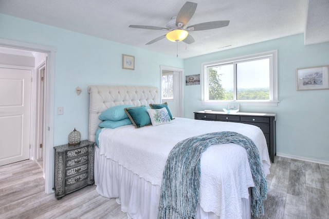 270 Heritage Vlg Unit D, Southbury, CT 06488 - bedroom featuring light wood-type flooring and ceiling fan
