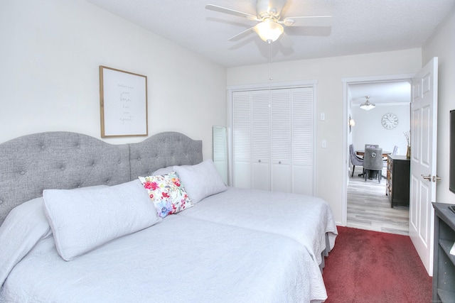 270 Heritage Vlg Unit D, Southbury, CT 06488 - carpeted bedroom featuring a closet and a ceiling fan