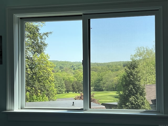 270 Heritage Vlg Unit D, Southbury, CT 06488 - doorway with a wooded view