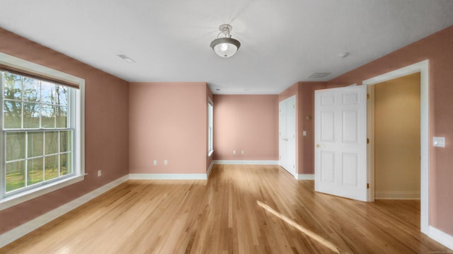 empty room featuring light hardwood / wood-style floors