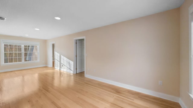 empty room featuring light hardwood / wood-style floors