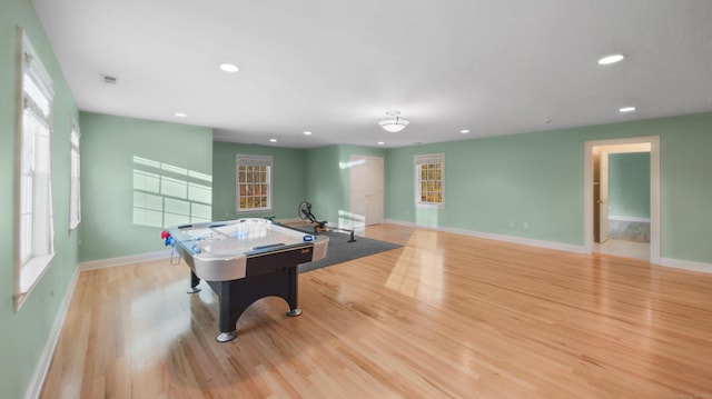 recreation room featuring light hardwood / wood-style flooring