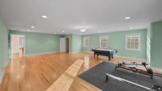 game room featuring light wood-type flooring