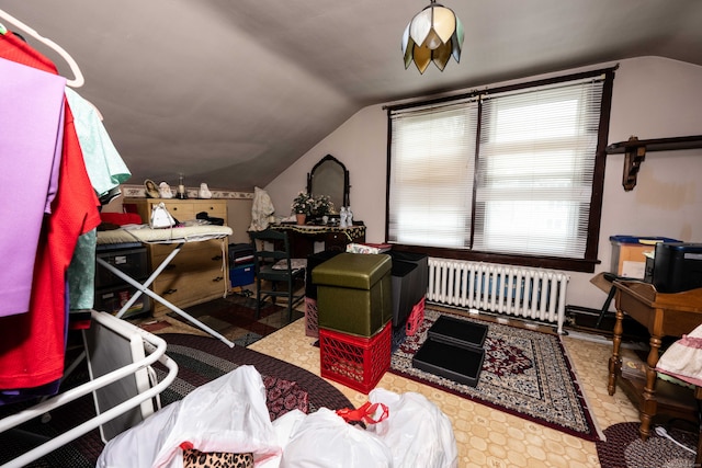 bonus room with lofted ceiling and radiator heating unit