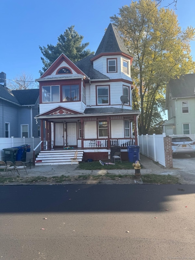 victorian home featuring a porch