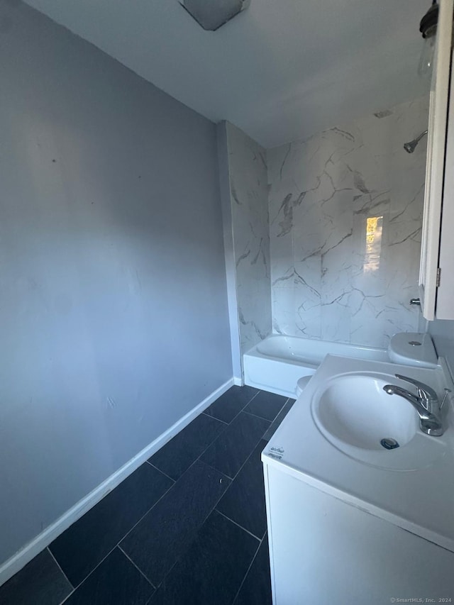 full bathroom featuring tile patterned floors, shower / tub combination, vanity, and toilet