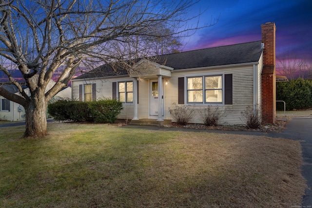 view of front of home featuring a yard