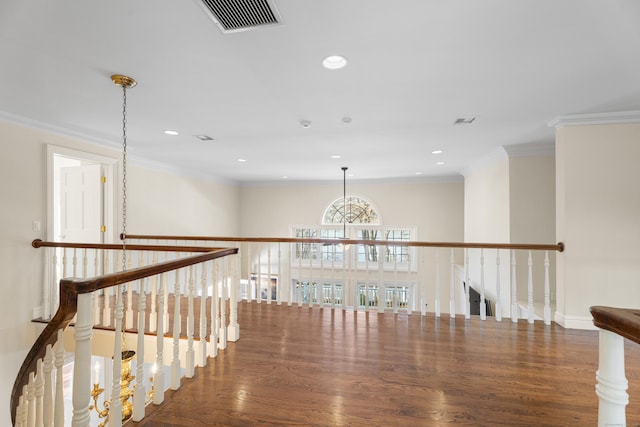 hallway featuring crown molding and dark wood-type flooring