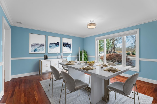 dining area with dark hardwood / wood-style flooring and ornamental molding