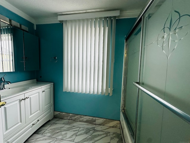 bathroom with vanity and a textured ceiling