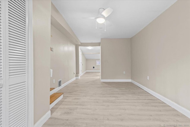 hall with light hardwood / wood-style flooring