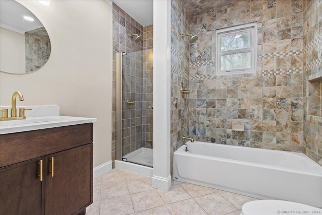 bathroom featuring toilet, tile patterned floors, and vanity