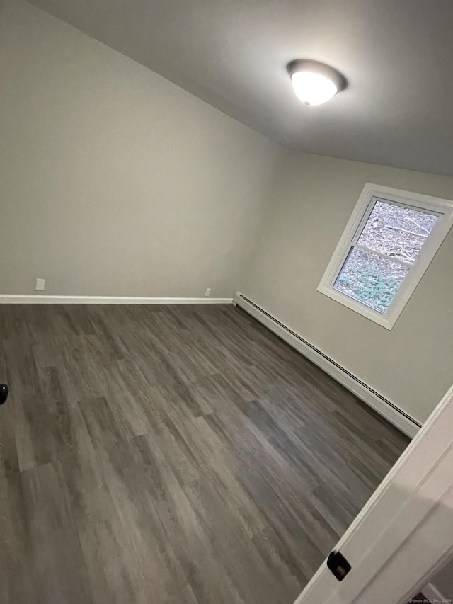 empty room featuring dark hardwood / wood-style flooring