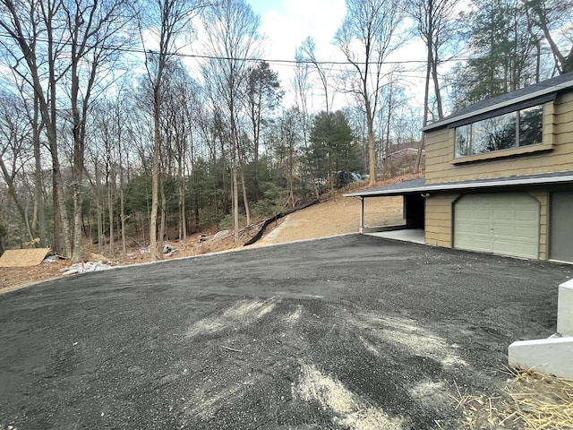 view of yard featuring a garage