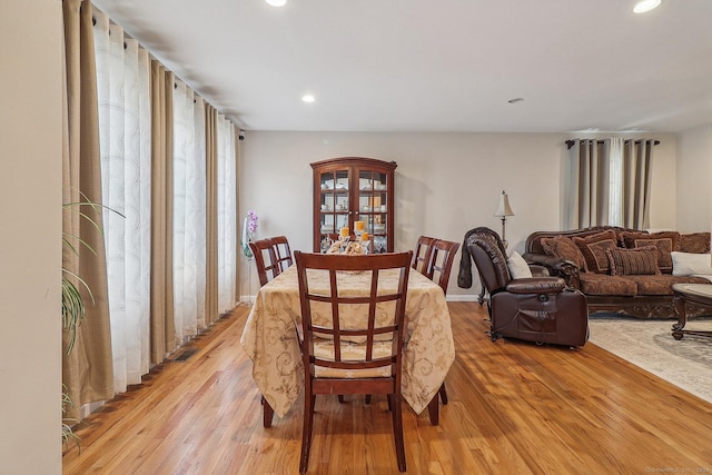 dining room featuring light hardwood / wood-style flooring