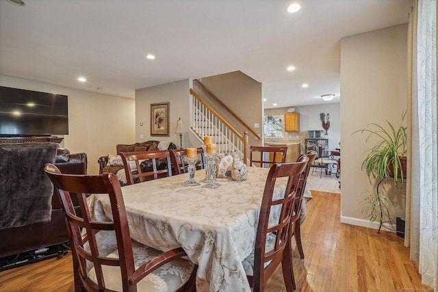 dining room with light wood-type flooring