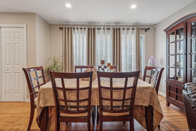 dining room with light hardwood / wood-style flooring